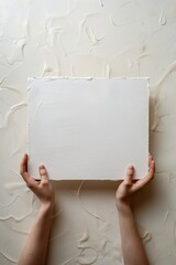 Hands stretching canvas mockup with empty center for logo or text