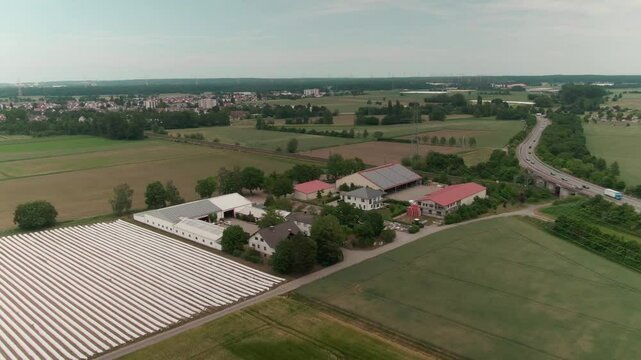 Drone View of a Modern Farm in Europe &ndash; Aerial Footage of Agricultural Buildings and Farmland