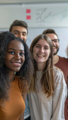 Obraz premium Diverse Group of Students Smiling in Classroom with Natural Daylight
