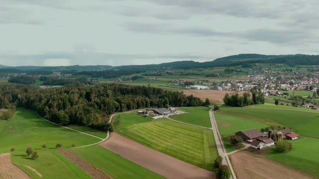 Drone View of a Modern Farm in Europe &ndash; Aerial Footage of Agricultural Buildings and Farmland