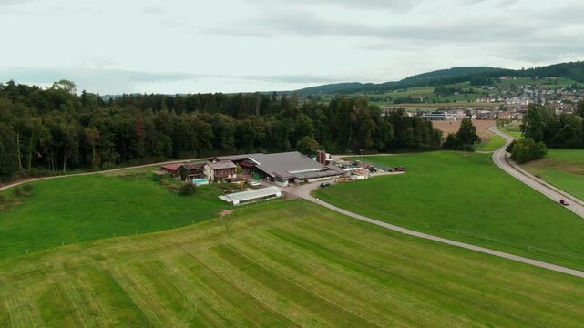 Drone View of a Modern Farm in Europe &ndash; Aerial Footage of Agricultural Buildings and Farmland