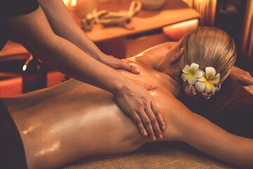 Caucasian woman customer enjoying relaxing anti-stress spa massage and pampering with beauty skin...