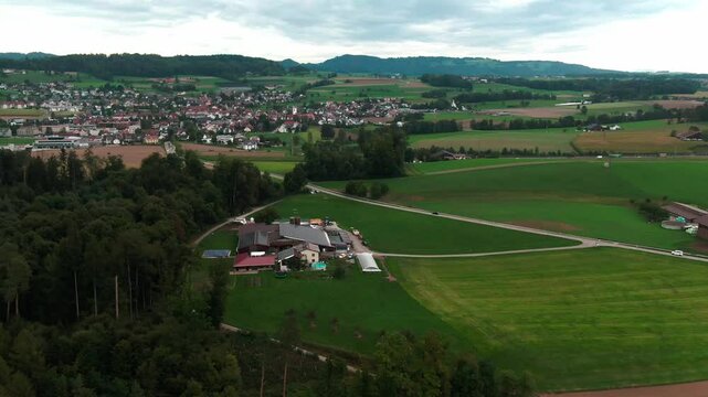 Drone View of a Modern Farm in Europe &ndash; Aerial Footage of Agricultural Buildings and Farmland