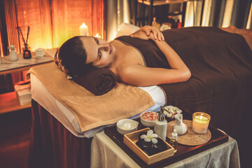 Caucasian woman customer enjoying relaxing anti-stress spa massage and pampering with beauty skin...