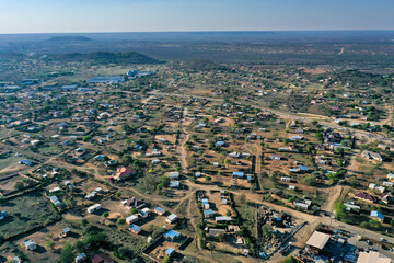 aerial view Botswana African village Serowe, infrastructure highway with traffic cars