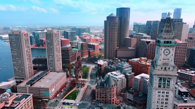 Stunning scenery of a beautiful downtown of Boston, Massachusetts, USA. Drone footage above the city at the waterfront of the Charles River.
