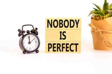 Nobody is perfect symbol. Concept words Nobody is perfect on beautiful wooden block. Beautiful...