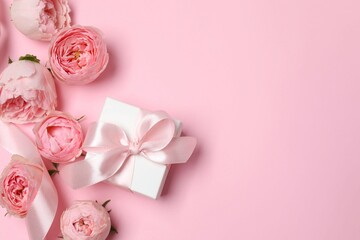 Beautiful pink peony roses gift box on color background, space for text