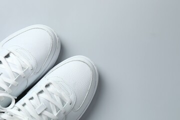 White sneakers on a gray background