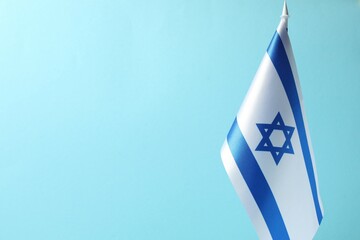 National flag of Israel on gray background,  top view and space for text. National symbol