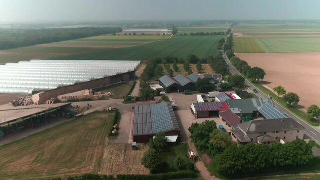 Drone Footage of Greenhouses on a Modern Farm in Europe &ndash; Aerial View of Agricultural Production