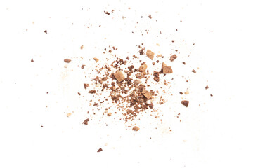 Crumbled Cookies and Powdered Sugar Explosion Isolated on Black Background