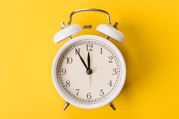 Vintage alarm clock as a conceptual background for deadlines for tasks in business