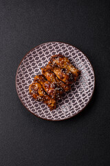 Grilled chicken wings in teriyaki sauce. Hot spicy takeaway food