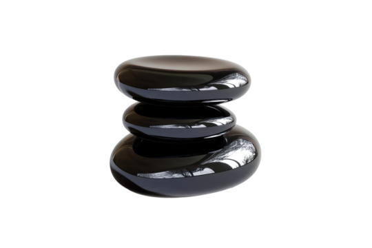 Black polished stones stacked in a smooth arrangement for decor
