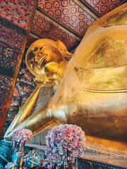Wat Pho Temple. Lying Buddha statue Bangkok Thailand.