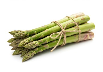 Bundle of fresh green asparagus tied with twine on a white background