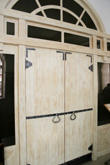 Interior of a room with wooden door, closeup of photo