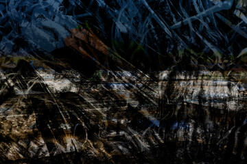 Chaotic dark abstract featuring layered black, beige, and pale gray scratches over a distorted surface. The image evokes torn fabric or damaged negatives, suggesting themes of decay, erosion, and mech