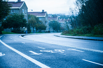 Curved road with bicycle lane.