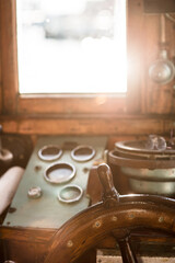 Vintage wooden ship steering wheel.