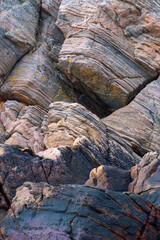 close-up of weathered rock formations with intricate textures.