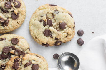 Overhead view of chocolate chip cookies, top view of homemade chocolate chip cookies on a white background