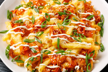 Loaded Kimchi Fries with cheese, mayonnaise and spring onion