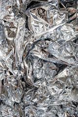 Crumpled Silver Foil Background – Shiny Metallic Party Decoration Texture