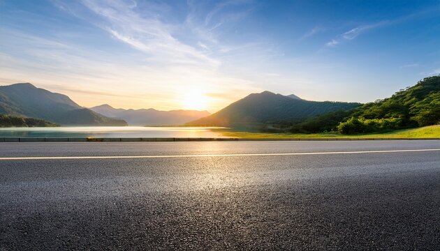 asphalt road and lake with green mountain scenery at sunset - Powered by Adobe
