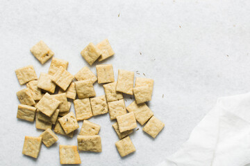 Overhead view of homemade crackers, top view of freshly baked cracker biscuits, process of making...