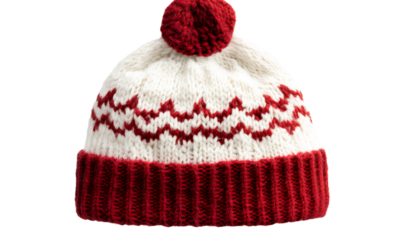  Red winter hat with a white pattern and a bobble, isolated on a transparent background. Cutout PNG file, high resolution,