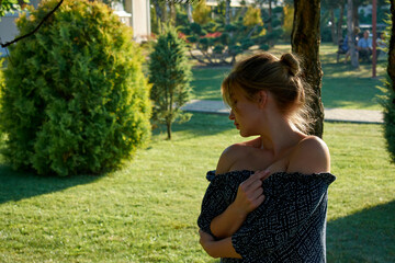 A woman standing in a yard