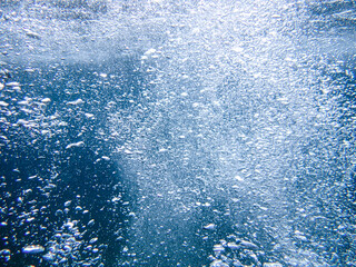 Bubbles under the sea in the crystal clear green sea water. Mediterranean bubbles. Real image very suitable for backgrounds, Rising Bubbles in Deep Underwater, Under with bubble. Great for background.