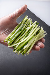 Macro Shot of Freshly Cut Cucumber Sticks.
Close-up view of green cucumber sticks cut into even strips, showing juicy texture and vibrant freshness, ideal for salads or sushi prep.
