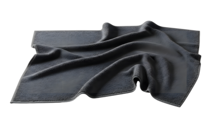 A soft, dark gray blanket draped elegantly on a flat surface, creating a cozy atmosphere with subtle shadows