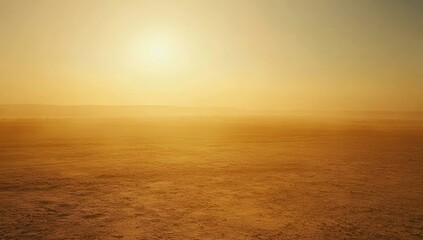 Obraz premium Vast desert landscape bathed in golden sunlight, hazy with dust