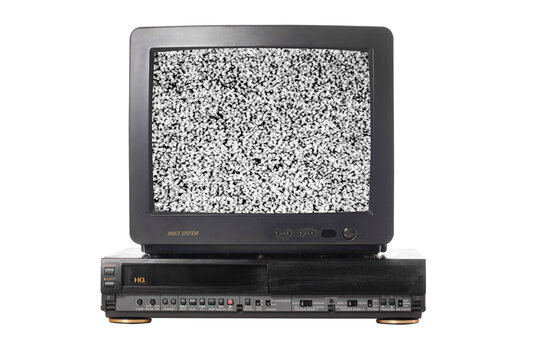 Old vintage TV set televisor isolated on white background with no signal television grainy noise effect on the screen and video recorder.