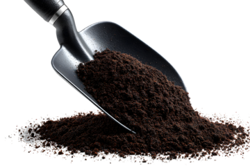 Black garden scoop with soil gardening tool dark background