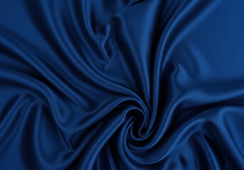 Fototapeta premium Dark blue silk fabric glimmering in the light.