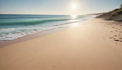 Fototapeta premium Sun-kissed sand meets gentle turquoise waves, creating a tranquil coastal scene , sun, coast, nature