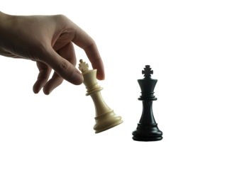 Player defeating his opponent and winning at chess challenge