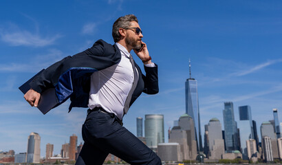 Business success in big city. Businessman running to success. Business success. Successful...