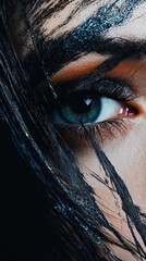 Artistic expression of smudged eyeliner strokes reveals captivating beauty against a dark moody backdrop