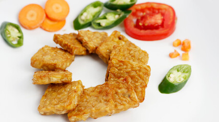 fried tempeh isolated on white background. indonesia food tempeh for healthy food.