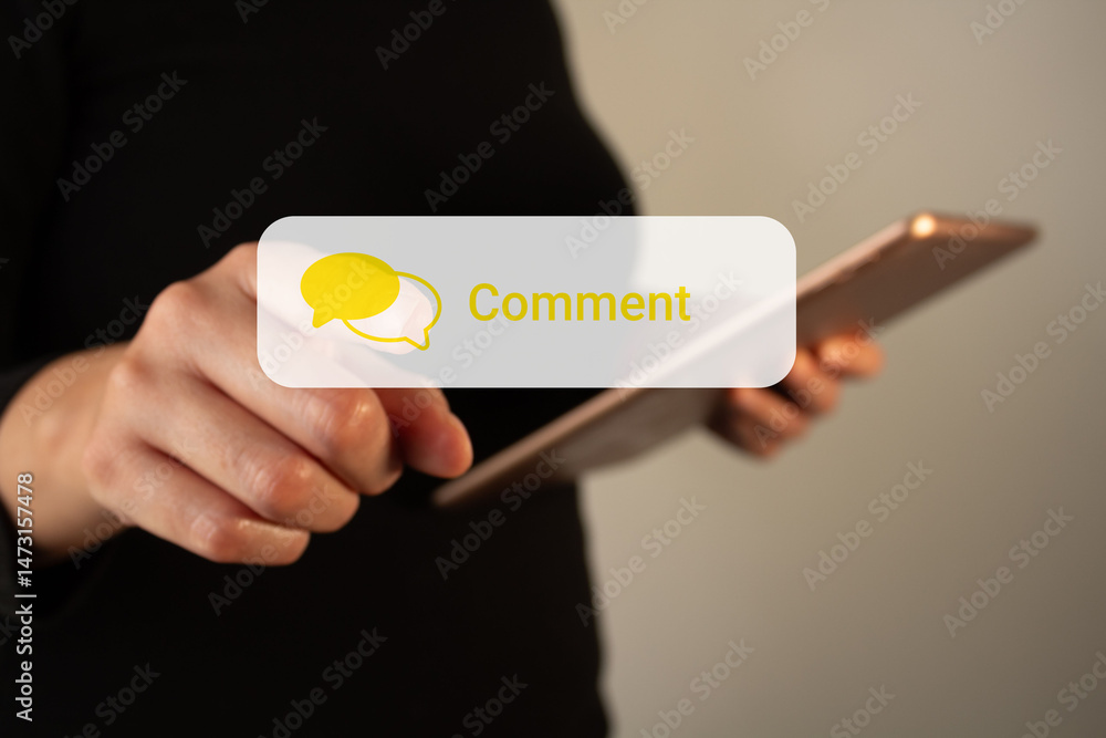 Poster woman's hand holding a tablet while pointing at a virtual button with the word comments and a speech
