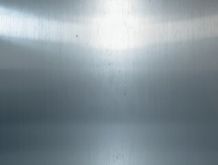Obraz premium Abstract metallic surface with brushed steel texture and reflective highlights