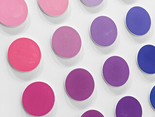 Colorful palette of circular pigments arranged in a beautiful display at an art studio in early...