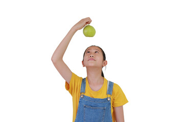 Portrait of Asian girl kid holding a fresh guava above over head isolated on white studio...