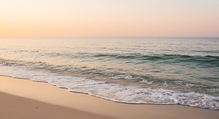 Fototapeta premium Beautiful beach ocean view at sunset for travel and summer vacation photography with golden light glow